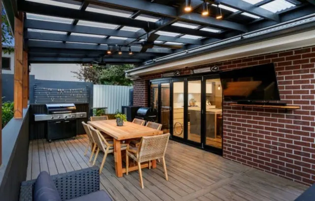 Alfresco deck with pergola and outdoor kitchen
